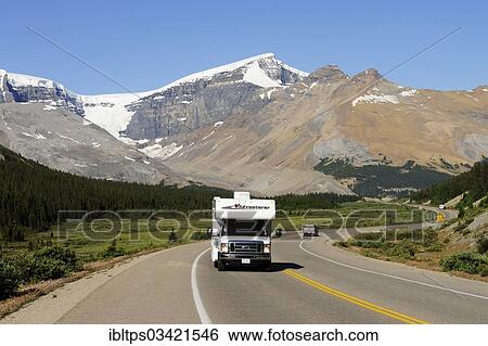 Stock Photograph - "Camper on the Icefields Parkway through the Rocky Mountains, Jasper National Park, Alberta Province, Canada, North America". Fotosearch