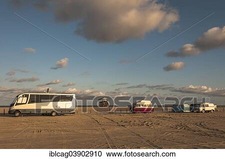 "Campers on a beach parking site in the morning light, Sankt Peter-Ording, Eiderstedt, North Frisia, Schleswig-Holstein, Germany, Europe" View Large Photo Image Stock Image - "Campers on a beach parking site in the morning light, Sankt Peter-Ording, Eiderstedt, North Frisia, Schleswig-Holstein, Germany, Europe". Fotosearch