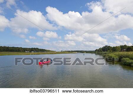 "Canadian canoe on the Prerower Strom river near Prerow, Darss-Zingst, Bodden Landscape of Vorpommern National Park, Mecklenburg-Western Pomerania, Germany, Europe" View Large Photo Image Stock Image - "Canadian canoe on the Prerower Strom river near Prerow, Darss-Zingst, Bodden Landscape of Vorpommern National Park, Mecklenburg-Western Pomerania, Germany, Europe". Fotosearch