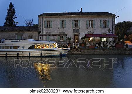 "Canal du Midi at Bram, restaurant with pier, Carcassonne, Languedoc-Roussillon, Aude, France, Europe" View Large Photo Image Stock Photo - "Canal du Midi at Bram, restaurant with pier, Carcassonne, Languedoc-Roussillon, Aude, France, Europe". Fotosearch