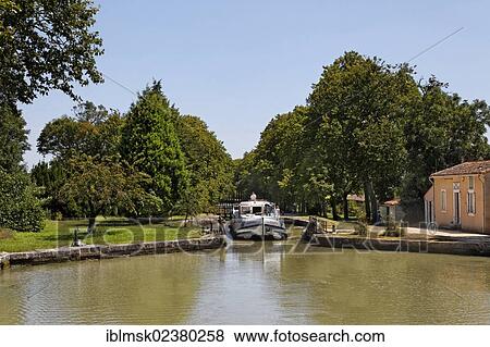 "Canal du Midi at the Ecluse du Roc lock, Pk 57. 5, Castelnaudary, Carcassonne, Languedoc-Roussillon, Aude, France, Europe" View Large Photo Image Stock Photo - "Canal du Midi at the Ecluse du Roc lock, Pk 57. 5, Castelnaudary, Carcassonne, Languedoc-Roussillon, Aude, France, Europe". Fotosearch