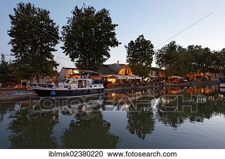 "Canal du Midi in Trebes, restaurants at the harbour, Carcassonne, Languedoc-Roussillon, Aude, France, Europe" View Large Photo Image Stock Image - "Canal du Midi in Trebes, restaurants at the harbour, Carcassonne, Languedoc-Roussillon, Aude, France, Europe". Fotosearch