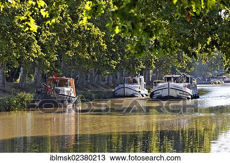 "Canal du Midi near Homps, harbour with promenade and restaurants, Carcassonne, Languedoc-Roussillon, Aude, France, Europe" View Large Photo Image Stock Image - "Canal du Midi near Homps, harbour with promenade and restaurants, Carcassonne, Languedoc-Roussillon, Aude, France, Europe". Fotosearch