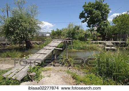 "Canal in Vylkove or Vilkovo, also known as """"Ukrainian Venice"""", Ukraine, Eastern Europe, Europe" View Large Photo Image Picture - "Canal in Vylkove or Vilkovo, also known as """"Ukrainian Venice"""", Ukraine, Eastern Europe, Europe". Fotosearch
