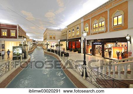 Stock Image - "Canal, luxury shopping centre, Villaggio Mall designed in a Venetian style, Aspire Zone, Doha, Doha, Qatar, Asia". Fotosearch