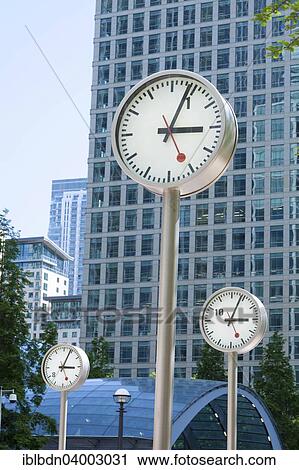 Stock Image - "Canary Wharf clocks, London, England, United Kingdom, Europe". Fotosearch