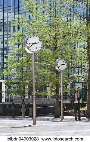 Stock Photo - "Canary Wharf clocks, London, England, United Kingdom, Europe". Fotosearch