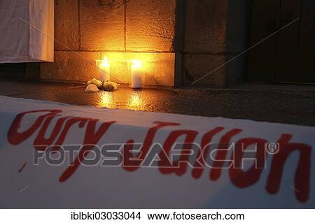 "Candles and flowers at the entrance to the Dessau police station where Oury Jalloh, a refugee from Sierra Leone, died, Dessau, dessau, Saxony-Anhalt, Germany, Europe" View Large Photo Image Picture - "Candles and flowers at the entrance to the Dessau police station where Oury Jalloh, a refugee from Sierra Leone, died, Dessau, dessau, Saxony-Anhalt, Germany, Europe". Fotosearch