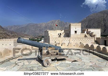 "Cannon on the tower of Nakhl Fort or Husn Al Heem, fortress, historic mudbrick building, Jebel Nakhl Massiv, Al-Batinah province, Sultanate of Oman, Arabian Peninsula" View Large Photo Image Stock Photo - "Cannon on the tower of Nakhl Fort or Husn Al Heem, fortress, historic mudbrick building, Jebel Nakhl Massiv, Al-Batinah province, Sultanate of Oman, Arabian Peninsula". Fotosearch