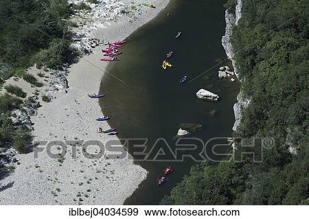 Stock Photo - "Canoeing on the Ardeche river in the Gorges dâ€™Ardeche, Ardeche, France, Europe". Fotosearch