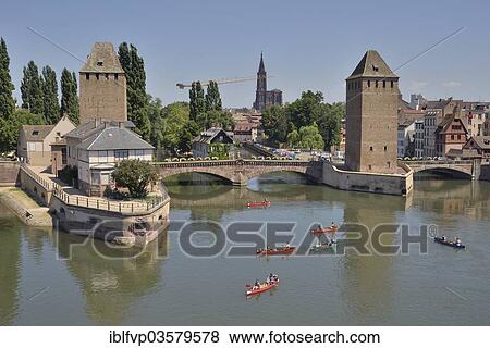 "Canoeists on the River Ill at the Ponts Couverts bridge with the towers, UNESCO World Heritage Site, historic centre or Grand Ile, Strasbourg, Departement Bas-Rhin, Alsace, France, Europe" View Large Photo Image Stock Photo - "Canoeists on the River Ill at the Ponts Couverts bridge with the towers, UNESCO World Heritage Site, historic centre or Grand Ile, Strasbourg, Departement Bas-Rhin, Alsace, France, Europe". Fotosearch