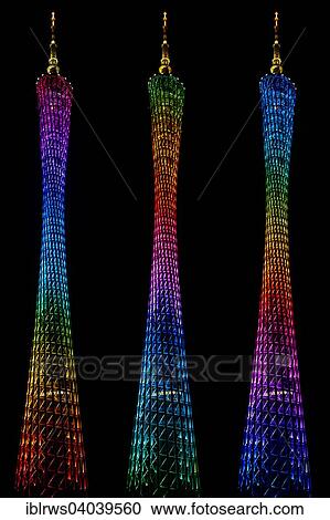 Stock Image - "Canton Tower, TV tower, with different illuminations at night, composite, Guangzhou, Guangdong, China, Asia". Fotosearch