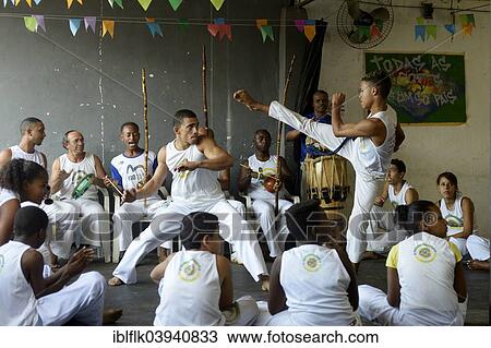 "Capoeira, Afro-Brazilian martial dance, in a social project for children and teenagers, slum, Mangueirinha favela, Duque de Caxias, Rio de Janeiro, Brazil, South America" View Large Photo Image Stock Image - "Capoeira, Afro-Brazilian martial dance, in a social project for children and teenagers, slum, Mangueirinha favela, Duque de Caxias, Rio de Janeiro, Brazil, South America". Fotosearch