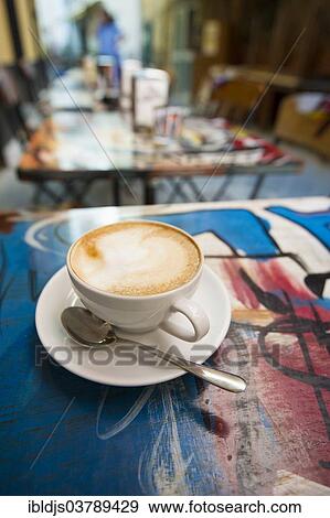 Stock Photo - "Cappuccino in a sidewalk cafe, Sestri Levante, Riviera di Levante, Genoa, Liguria, Italy, Europe". Fotosearch