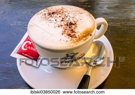 "Cappuccino with a sugar sachet and a spoon, Italy, Europe" View Large Photo Image Stock Photograph - "Cappuccino with a sugar sachet and a spoon, Italy, Europe". Fotosearch
