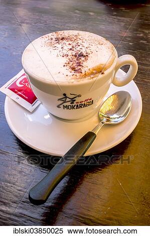 "Cappuccino with a sugar sachet and a spoon, Italy, Europe" View Large Photo Image Stock Photography - "Cappuccino with a sugar sachet and a spoon, Italy, Europe". Fotosearch