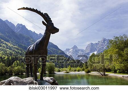 "Capricorn sculpture on Lake Jasna in Triglav National Park, Julian Alps, near Kranjska Gora, Slovenia, Europe" View Large Photo Image Stock Photo - "Capricorn sculpture on Lake Jasna in Triglav National Park, Julian Alps, near Kranjska Gora, Slovenia, Europe". Fotosearch