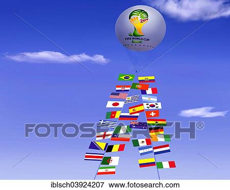 "Captive balloon, at its ropes the flags of the FIFA World Cup participants in 2014, against a blue cloudy sky" View Large Photo Image Stock Photo - "Captive balloon, at its ropes the flags of the FIFA World Cup participants in 2014, against a blue cloudy sky". Fotosearch