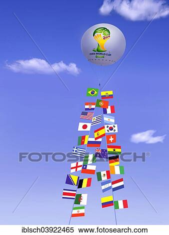 "Captive balloon, at its ropes the flags of the FIFA World Cup participants in 2014, against a blue cloudy sky" View Large Photo Image Stock Photography - "Captive balloon, at its ropes the flags of the FIFA World Cup participants in 2014, against a blue cloudy sky". Fotosearch
