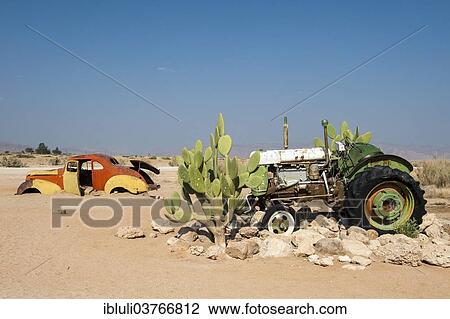 "Car and tractor wrecks, Solitaire, Khomas Region, Namibia, Africa" View Large Photo Image Stock Image - "Car and tractor wrecks, Solitaire, Khomas Region, Namibia, Africa". Fotosearch