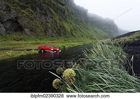 "Car crossing stream in Icelandic landscape, Vik, Iceland, Europe" View Large Photo Image Stock Photo - "Car crossing stream in Icelandic landscape, Vik, Iceland, Europe". Fotosearch