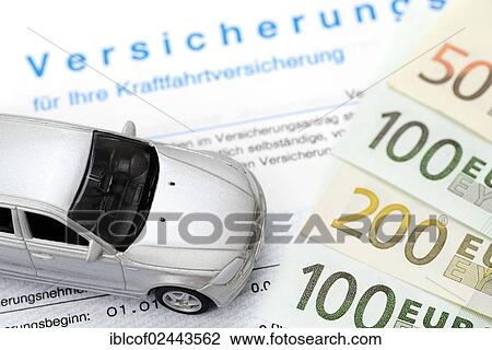 Stock Image - "Car insurance contract and miniature car, symbolic image for a rise in car insurance premiums". Fotosearch