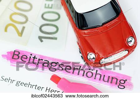 Stock Image - "Car insurance letter and miniature car, symbolic image for a rise in car insurance premiums". Fotosearch