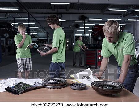 "Car mechanic apprentices studying during a training session, St. Gertraudi, Reith im Alpbachtal, Kufstein District, North Tirol, Tirol, Austria, Europe" View Large Photo Image Stock Image - "Car mechanic apprentices studying during a training session, St. Gertraudi, Reith im Alpbachtal, Kufstein District, North Tirol, Tirol, Austria, Europe". Fotosearch