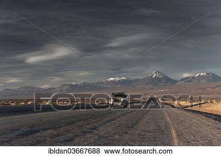 "Car on a dirt road at dusk, Antofagasta Region, Chile, South America" View Large Photo Image Stock Photo - "Car on a dirt road at dusk, Antofagasta Region, Chile, South America". Fotosearch