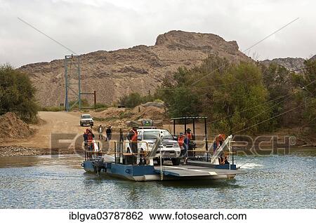 "Car on the Octha ferry pontoon across the Orange River between South Africa and Namibia, on the way to the Sendelingsdrif pier, Richtersveld, South Africa, Africa" View Large Photo Image Stock Image - "Car on the Octha ferry pontoon across the Orange River between South Africa and Namibia, on the way to the Sendelingsdrif pier, Richtersveld, South Africa, Africa". Fotosearch
