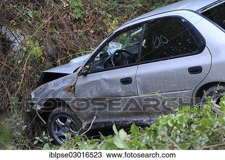 "Car which has driven off the road and down an embankment, traffic accident" View Large Photo Image Stock Image - "Car which has driven off the road and down an embankment, traffic accident". Fotosearch