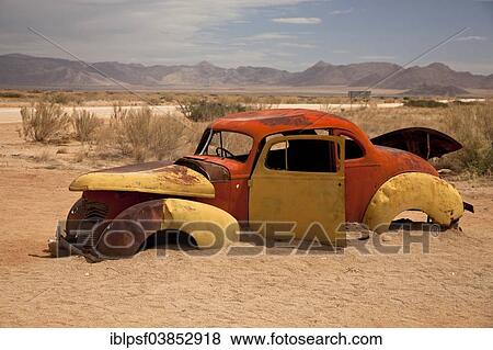 "Car wreck in the desert, Solitaire, Namibia, Africa" View Large Photo Image Stock Photo - "Car wreck in the desert, Solitaire, Namibia, Africa". Fotosearch
