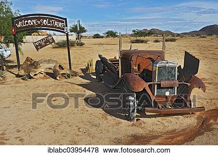 "Car wreck, Solitaire, historically Areb, since 1848 a small private settlement on the same named farm, Namib-Naukluft National Park, Namibia, Africa" View Large Photo Image Stock Photo - "Car wreck, Solitaire, historically Areb, since 1848 a small private settlement on the same named farm, Namib-Naukluft National Park, Namibia, Africa". Fotosearch