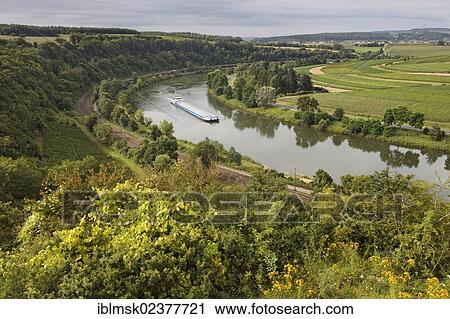 "Cargo boat on the Moselle river near Trier, near Wehr, Rhineland-Palatinate, Germany, Europe" View Large Photo Image Stock Image - "Cargo boat on the Moselle river near Trier, near Wehr, Rhineland-Palatinate, Germany, Europe". Fotosearch