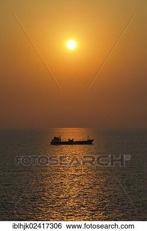 Cargo ship at sunset, Lefkas or Lefkada, Greece, Europe View Large Photo Image Stock Photograph - Cargo ship at sunset, Lefkas or Lefkada, Greece, Europe. Fotosearch