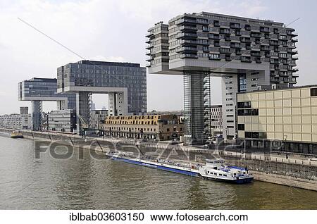 "Cargo ship, crane towers, office buildings, residential buildings, Rhine, Rheinauhafen, Cologne, Rhineland, North Rhine-Westphalia, Germany, Europe" View Large Photo Image Stock Image - "Cargo ship, crane towers, office buildings, residential buildings, Rhine, Rheinauhafen, Cologne, Rhineland, North Rhine-Westphalia, Germany, Europe". Fotosearch