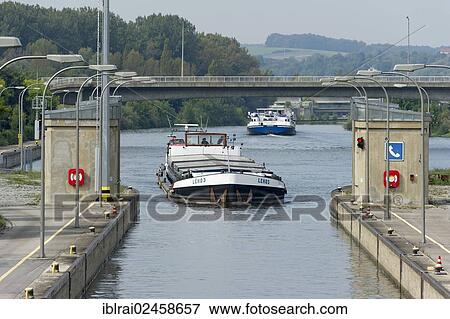 Stock Photo - "Cargo ship entering a lock, Rhine? ÇôMain? ÇôDanube Canal, Regensburg, Upper Palatinate, Bavaria, Germany, Europe". Fotosearch