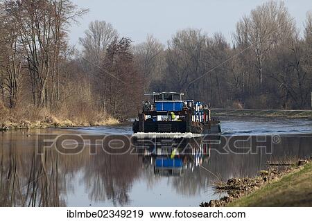 "Cargo ship floating on the Havel Canal near Wustermark, Havelland region, Brandenburg, Germany, Europe" View Large Photo Image Stock Photo - "Cargo ship floating on the Havel Canal near Wustermark, Havelland region, Brandenburg, Germany, Europe". Fotosearch