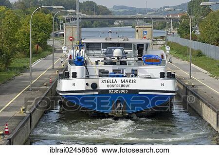 Stock Photograph - "Cargo ship leaving a lock, Rhine? ÇôMain? ÇôDanube Canal, Regensburg, Upper Palatinate, Bavaria, Germany, Europe". Fotosearch