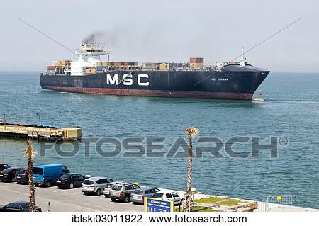 Stock Image - "Cargo ship, MSC Adriana, departing from the port of Koper, Slovenia, Europe, Koper, Slovenian Littoral, Slovenia, Europe". Fotosearch