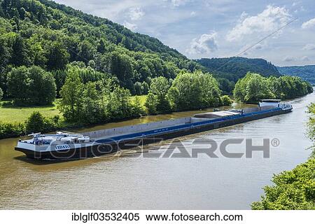 "Cargo ship on the Main-Danube Canal, Altmuhltal, near Essing, Bavaria, Germany, Europe" View Large Photo Image Stock Photography - "Cargo ship on the Main-Danube Canal, Altmuhltal, near Essing, Bavaria, Germany, Europe". Fotosearch