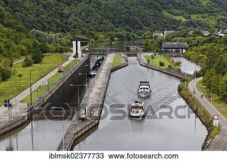 Stock Image - "Cargo ship on the Saar river near Konz, Konzem lock near Hamm, Konz, Rhineland-Palatinate, Germany, Europe". Fotosearch