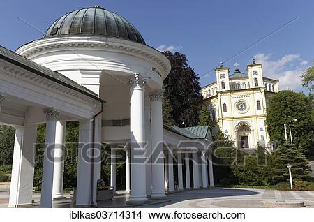 "Caroline Spring pavilion and the Dean Church of the Assumption, Marianske Lazne, Karlovy Vary Region, Bohemia, Czech Republic, Europe" View Large Photo Image Picture - "Caroline Spring pavilion and the Dean Church of the Assumption, Marianske Lazne, Karlovy Vary Region, Bohemia, Czech Republic, Europe". Fotosearch