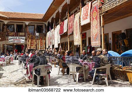 "Carpet merchants and a tea garden in a bazaar, Mugla, Mugla Province, Aegean region, Turkey, Asia" View Large Photo Image Stock Image - "Carpet merchants and a tea garden in a bazaar, Mugla, Mugla Province, Aegean region, Turkey, Asia". Fotosearch