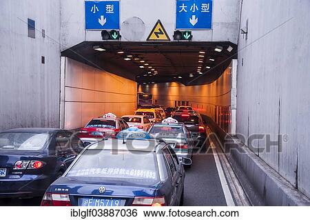 "Cars driving into a tunnel, traffic jam, Shanghai, China, Asia" View Large Photo Image Stock Photograph - "Cars driving into a tunnel, traffic jam, Shanghai, China, Asia". Fotosearch