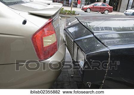 "Cars parked bumper to bumper, usual parking in the old town of Guayaquil, Ecuador, South America" View Large Photo Image Stock Image - "Cars parked bumper to bumper, usual parking in the old town of Guayaquil, Ecuador, South America". Fotosearch