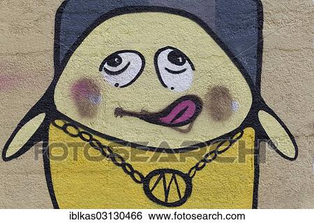 Stock Photograph - "Cartoon character licking its lips, graffiti, Meiderich, Duisburg, Ruhr district, North Rhine-Westphalia, Germany, Europe". Fotosearch