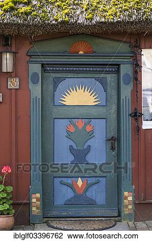 "Carved and painted door of a wooden house, Prerow, Fischland-Darss-Zingst, Mecklenburg-Western Pomerania, Germany, Europe" View Large Photo Image Stock Image - "Carved and painted door of a wooden house, Prerow, Fischland-Darss-Zingst, Mecklenburg-Western Pomerania, Germany, Europe". Fotosearch