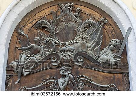 "Carved relief image on the wooden portal, Schleissheim New Palace, east side, Oberschleissheim, Upper Bavaria, Bavaria, Germany, Europe" View Large Photo Image Stock Photograph - "Carved relief image on the wooden portal, Schleissheim New Palace, east side, Oberschleissheim, Upper Bavaria, Bavaria, Germany, Europe". Fotosearch