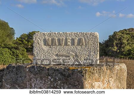 "Carved stone with the word """"Naveta"""" and a directional arrow, Naveta d'Es Tudons, burial site, Menorca, Spain, Europe" View Large Photo Image Stock Photo - "Carved stone with the word """"Naveta"""" and a directional arrow, Naveta d'Es Tudons, burial site, Menorca, Spain, Europe". Fotosearch